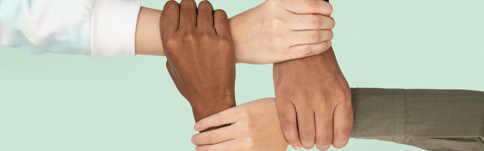 Diverse hands united business teamwork gesture